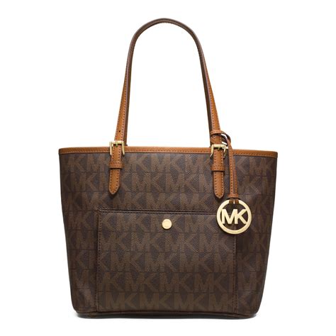 michael kors jet set logo medium travel tote brown|michael kors airplane print.